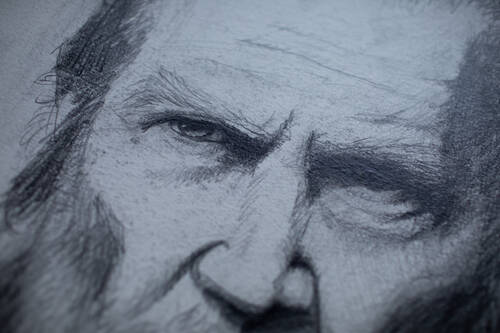 A pencil portrait of a face that kinda looks like jeff bridges