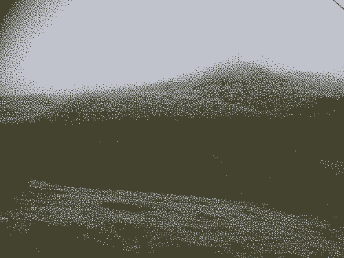 Pixelated image : A forest on the other side of a valley. At the top of it, the trees are frozen. At the bottom of it, they’re not. It makes a frozen gradient.