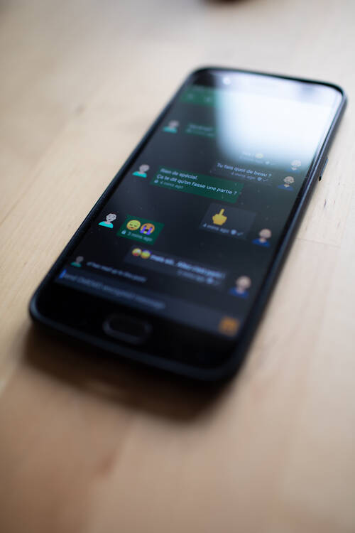 A phone with the Conversation Android app
